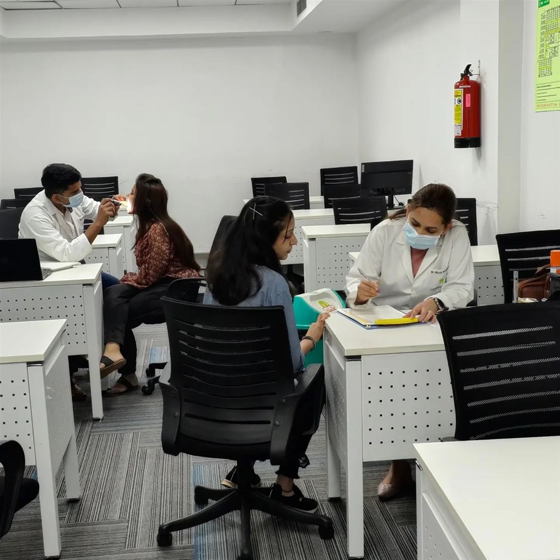 Dentists at work during a corporate dental camp
